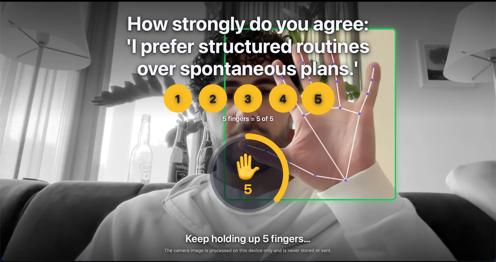 Camera-based survey asking how strongly you agree with 'I prefer structured routines over spontaneous plans', answered by holding up five fingers while hand tracking highlights the hand.
